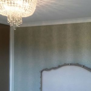 Wallpapered bedroom Hassocks